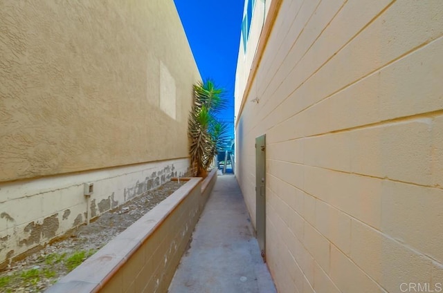view of side of home featuring stucco siding