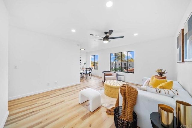 living room with recessed lighting, baseboards, ceiling fan, and wood finished floors