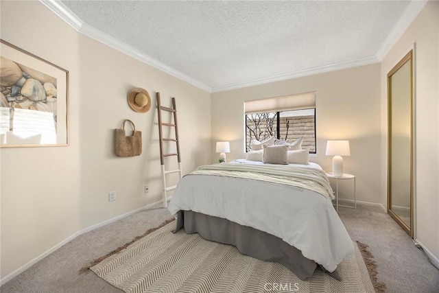 carpeted bedroom featuring a textured ceiling, ornamental molding, and baseboards