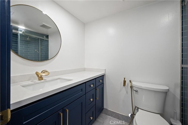8535 Village Ln, Rosemead, CA 91770 - bathroom with vanity, visible vents, toilet, tile patterned floors, and a tile shower