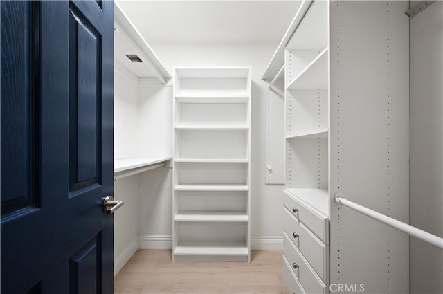 8535 Village Ln, Rosemead, CA 91770 - spacious closet featuring visible vents and light wood finished floors