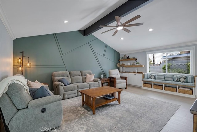 living room with crown molding, a decorative wall, lofted ceiling with beams, and a ceiling fan