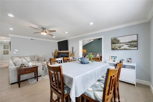dining room with visible vents, recessed lighting, light wood finished floors, and ceiling fan