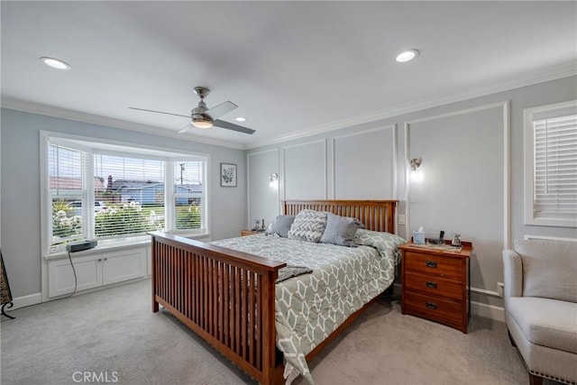 bedroom featuring recessed lighting, ornamental molding, and light carpet