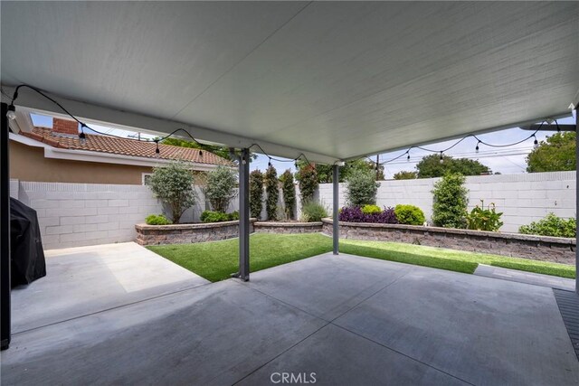view of patio with a fenced backyard