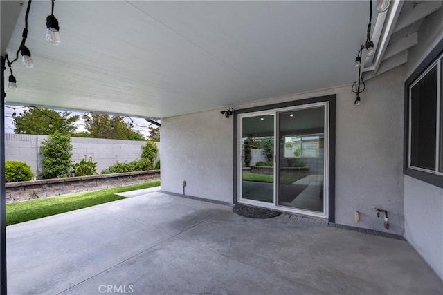 view of patio with fence