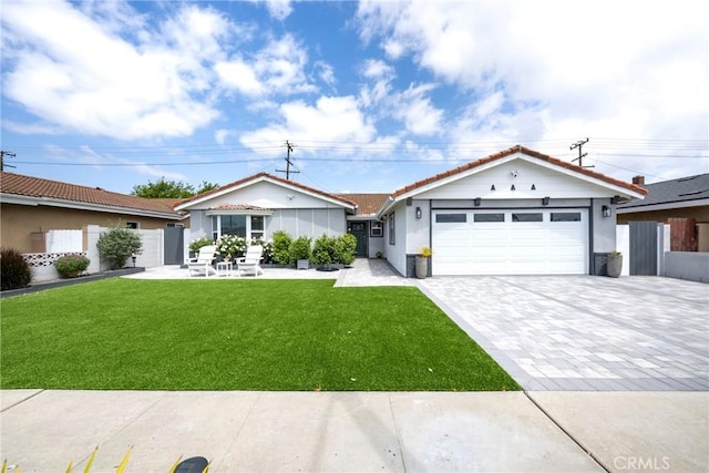 ranch-style house featuring a garage, stucco siding, a front yard, decorative driveway, and a tiled roof