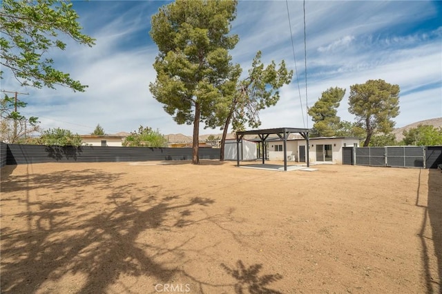 surrounding community featuring a fenced backyard