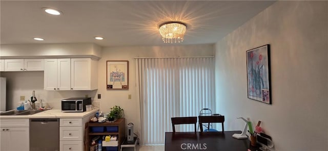 715 S Webster Ave Unit 30, Anaheim, CA 92804 - kitchen with stainless steel appliances, white cabinetry, a chandelier, and recessed lighting