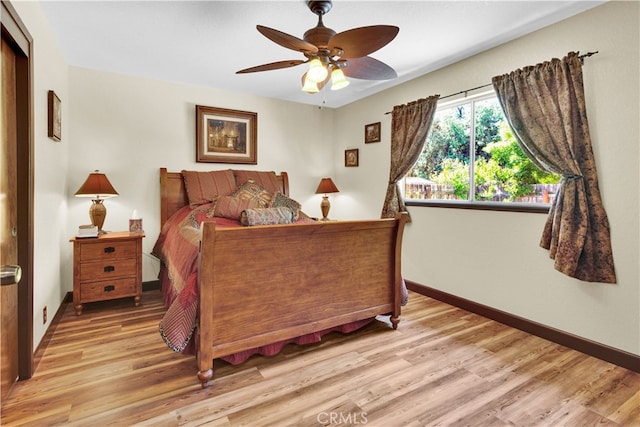 4957 Buck Tail Ln, Paso Robles, CA 93446 - bedroom with baseboards, light wood finished floors, and a ceiling fan
