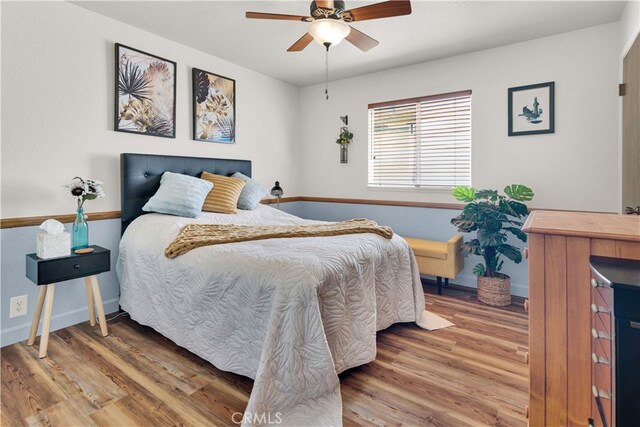 4957 Buck Tail Ln, Paso Robles, CA 93446 - bedroom featuring wood finished floors, baseboards, and a ceiling fan