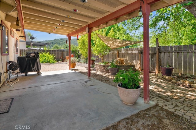 4957 Buck Tail Ln, Paso Robles, CA 93446 - fenced backyard featuring a patio and area for grilling