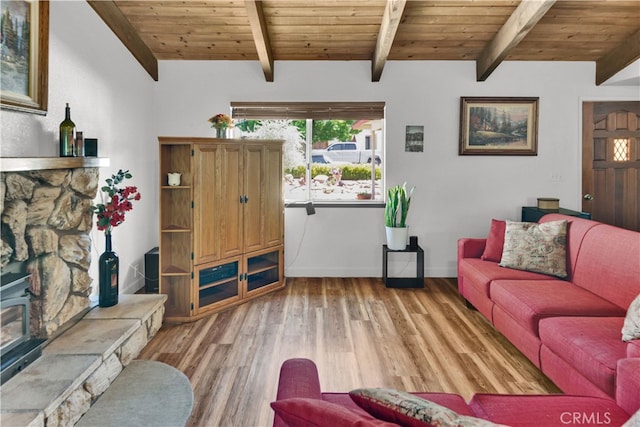 4957 Buck Tail Ln, Paso Robles, CA 93446 - living room featuring light wood-style floors, a fireplace, wooden ceiling, and baseboards