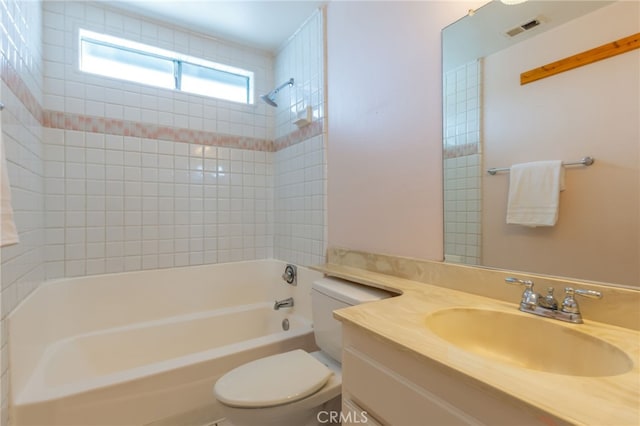 full bath with toilet, visible vents, tub / shower combination, and vanity