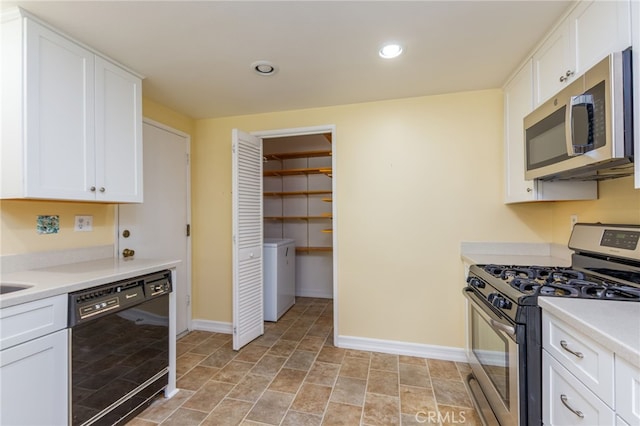 kitchen with appliances with stainless steel finishes, light countertops, baseboards, washer / dryer, and white cabinetry