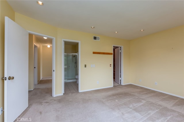 unfurnished bedroom with visible vents, recessed lighting, baseboards, and light carpet