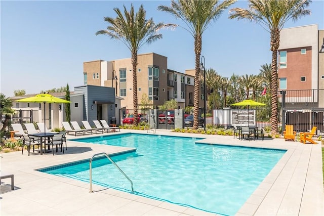 960 N Tangent Privado Unit 204, Ontario, CA 91764 - community pool featuring fence, a residential view, and a patio area
