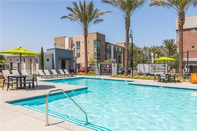960 N Tangent Privado Unit 204, Ontario, CA 91764 - community pool with fence and a patio area