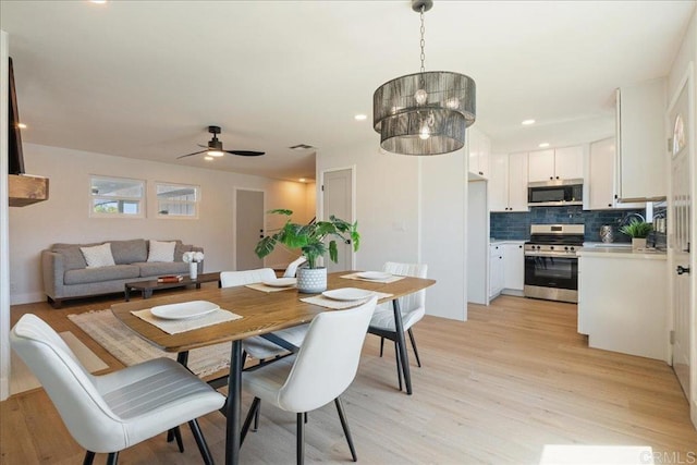 dining room with light wood-style floors, recessed lighting, and ceiling fan