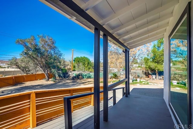 view of patio / terrace with fence and a deck