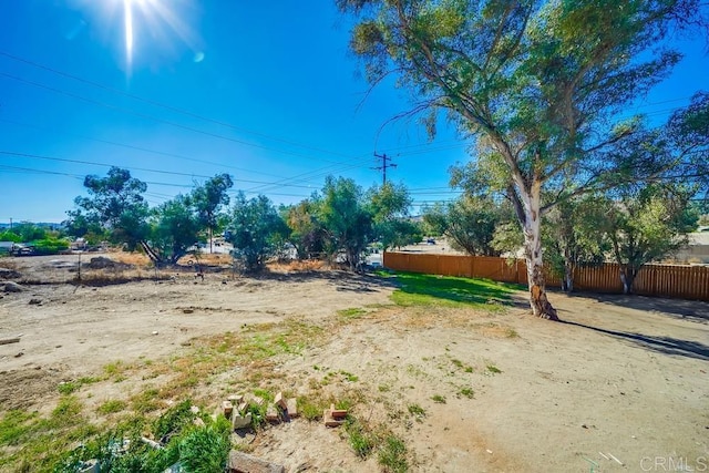 view of yard featuring fence