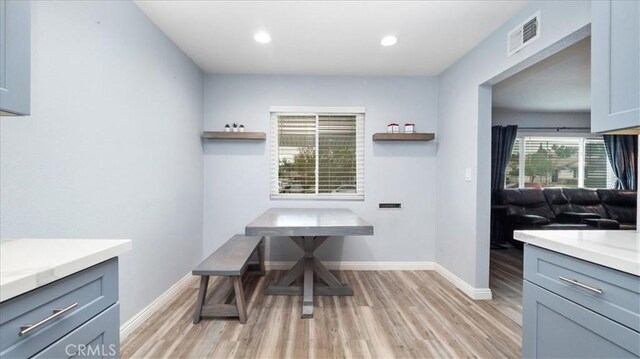 dining area featuring recessed lighting, baseboards, visible vents, and light wood finished floors
