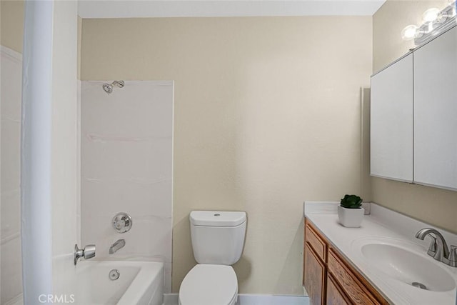 bathroom featuring vanity, toilet, and shower / washtub combination
