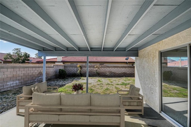 view of patio featuring an outdoor living space and a fenced backyard