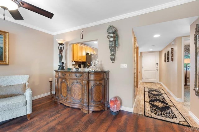 hall with baseboards, ornamental molding, and light wood-type flooring