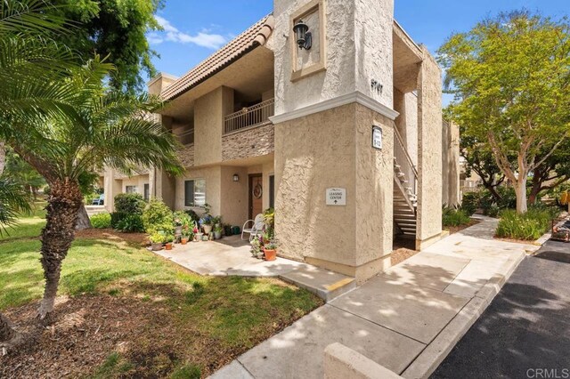 5707 Baltimore Dr Unit 12, La Mesa, CA 91942 - view of building exterior featuring stairway