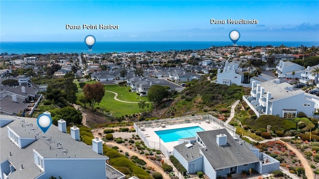 24612 Harbor View Dr Unit 55C, Dana Point, CA 92629 - aerial perspective of suburban area with a pool area and a nearby body of water