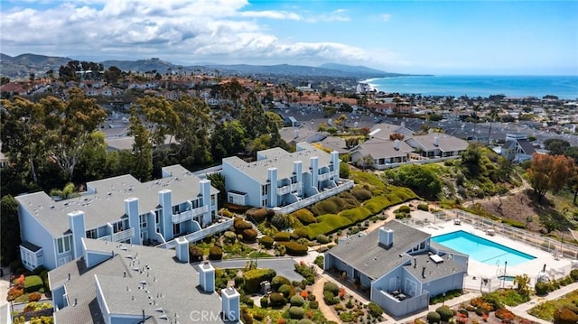 24612 Harbor View Dr Unit 55C, Dana Point, CA 92629 - aerial perspective of suburban area with a pool and a water and mountain view