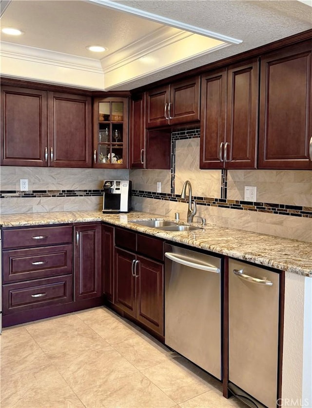 24612 Harbor View Dr Unit 55C, Dana Point, CA 92629 - kitchen with dishwasher, a sink, ornamental molding, a tray ceiling, and light stone countertops