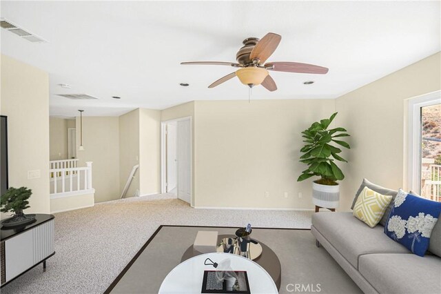 30526 Beryl Pl, Castaic, CA 91384 - carpeted living area featuring a ceiling fan, baseboards, visible vents, and recessed lighting