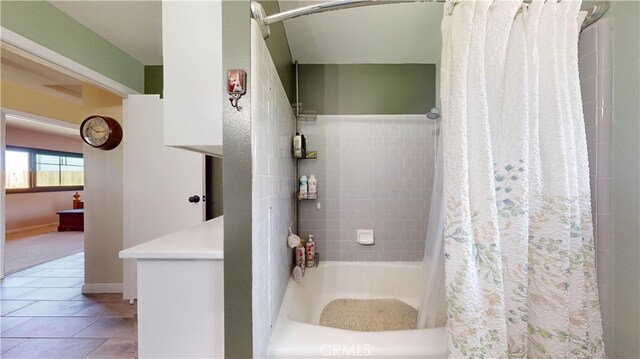 bathroom with tile patterned flooring