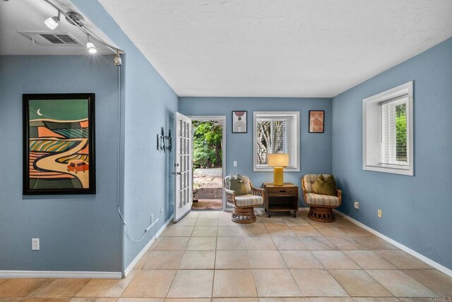 1994 Warmlands Ave, Vista, CA 92084 - living area with baseboards and light tile patterned floors