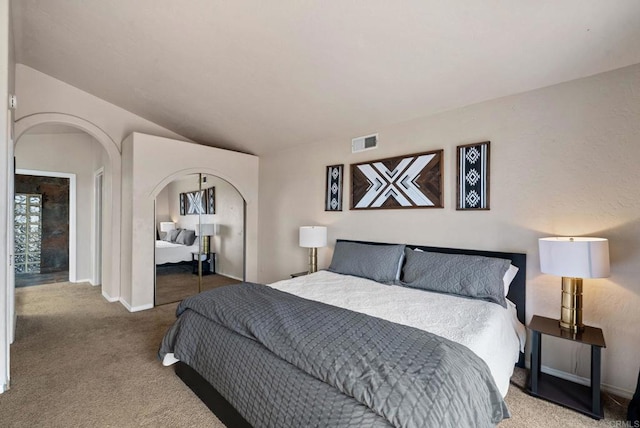 1994 Warmlands Ave, Vista, CA 92084 - bedroom featuring carpet floors, a closet, baseboards, and arched walkways