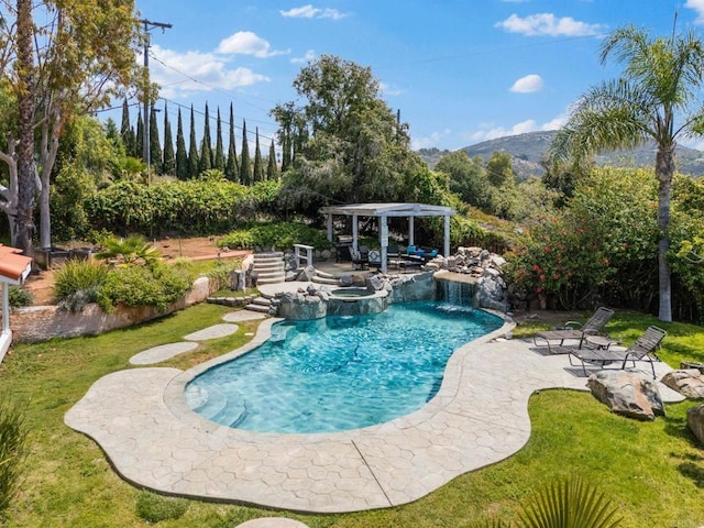 1994 Warmlands Ave, Vista, CA 92084 - view of swimming pool featuring a pergola, a patio, a lawn, and a pool with connected hot tub