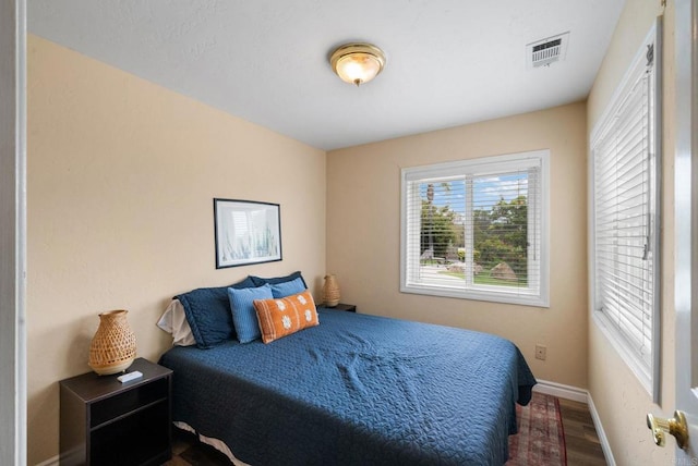 1994 Warmlands Ave, Vista, CA 92084 - bedroom featuring baseboards and wood finished floors