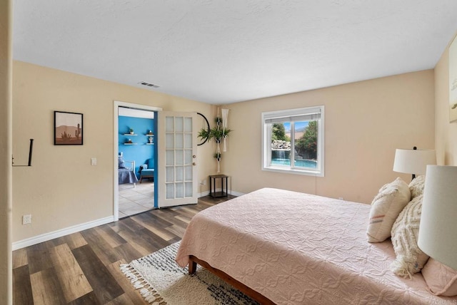 1994 Warmlands Ave, Vista, CA 92084 - bedroom with wood finished floors and baseboards