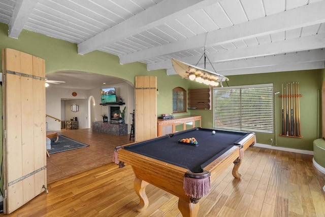 1994 Warmlands Ave, Vista, CA 92084 - recreation room featuring arched walkways, beamed ceiling, wood-type flooring, billiards table, and a warm lit fireplace