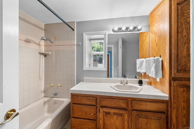1994 Warmlands Ave, Vista, CA 92084 - bathroom featuring shower / tub combination, vanity, and toilet