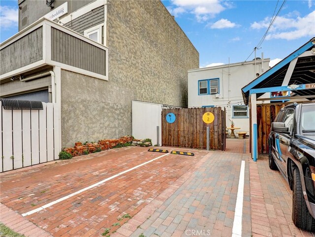 16855 12th St, Sunset Beach, CA 90742 - view of patio / terrace with fence