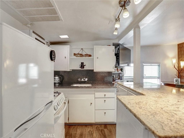 16855 12th St, Sunset Beach, CA 90742 - kitchen featuring white appliances, a sink, open shelves, decorative backsplash, and white cabinetry