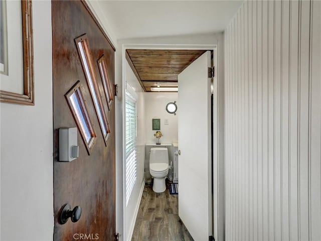 16855 12th St, Sunset Beach, CA 90742 - bathroom with wood finished floors, toilet, and wood ceiling