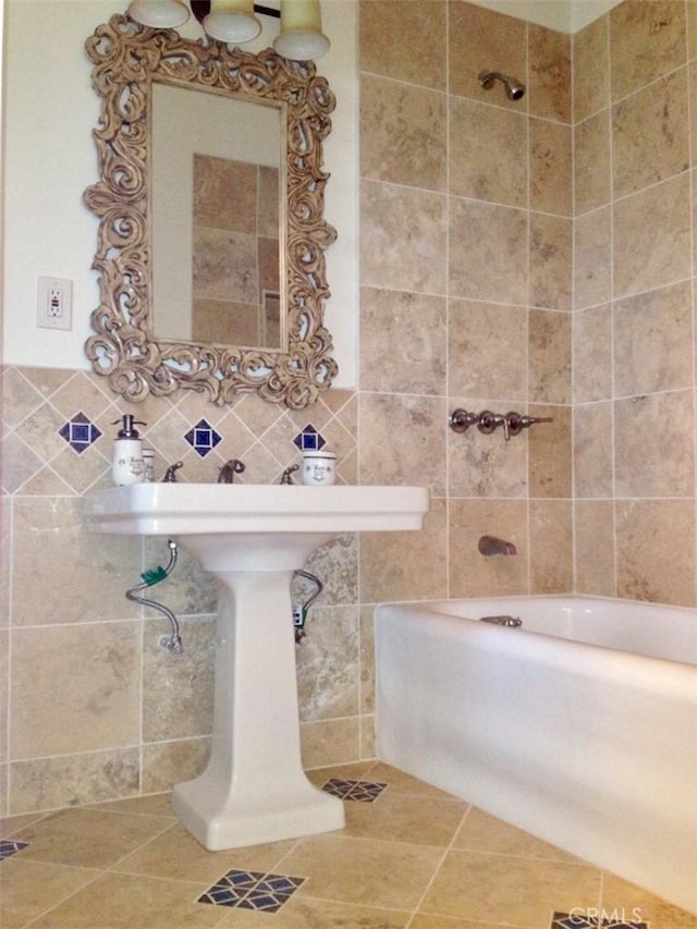 full bath featuring tile patterned flooring and tile walls