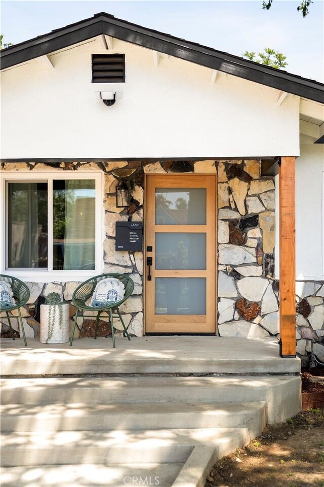 3420 Lifur Ave, Los Angeles, CA 90032 - entrance to property with stone siding and stucco siding