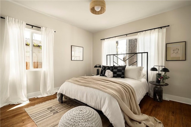 3420 Lifur Ave, Los Angeles, CA 90032 - bedroom with baseboards and wood finished floors