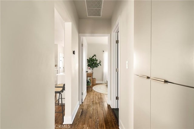 3420 Lifur Ave, Los Angeles, CA 90032 - hallway featuring dark wood finished floors and baseboards