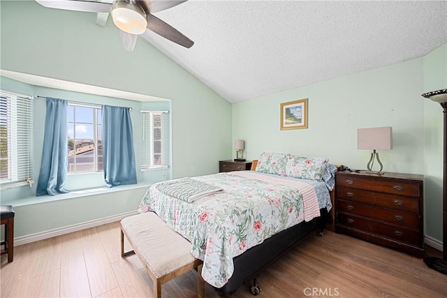 875 S Rexford St, Rialto, CA 92376 - bedroom featuring vaulted ceiling, wood finished floors, ceiling fan, a textured ceiling, and baseboards